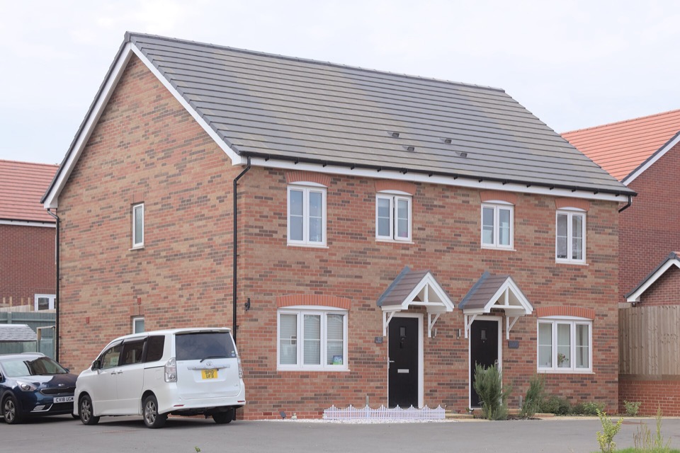 A red brick new-build semi-detached house in Sharphill, Nottinghamshire